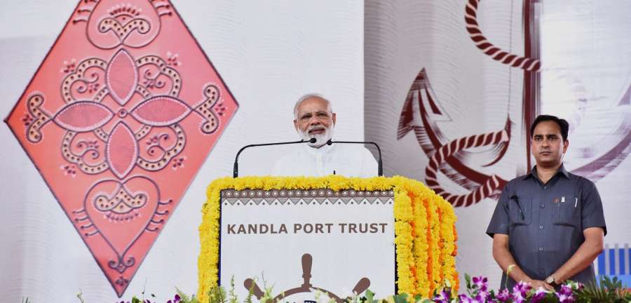Gandhidham: Prime Minister Narendra Modi addresses at the foundation stone laying ceremony of various developmental projects of Kandla Port, in Gandhidham, Gujarat on May 22, 2017. (Photo: IANS/PIB) by .