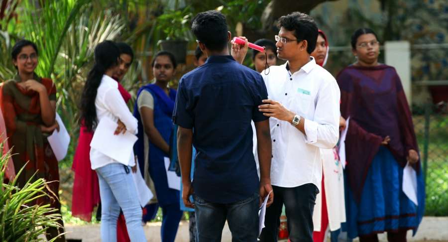 Chennai: Students appearing for National Eligibility and Entrance Test being frisked before entering exam hall in Chennai, on May 7, 2017. (Photo: IANS) by . 