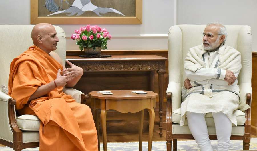 New Delhi: Head of the Mokshayatan Yog Sansthan, Saharanpur, Swami Dr. Bharat Bhushan calls on the Prime Minister Narendra Modi in New Delhi on Jan 6, 2017. (Photo: IANS/PIB) by .