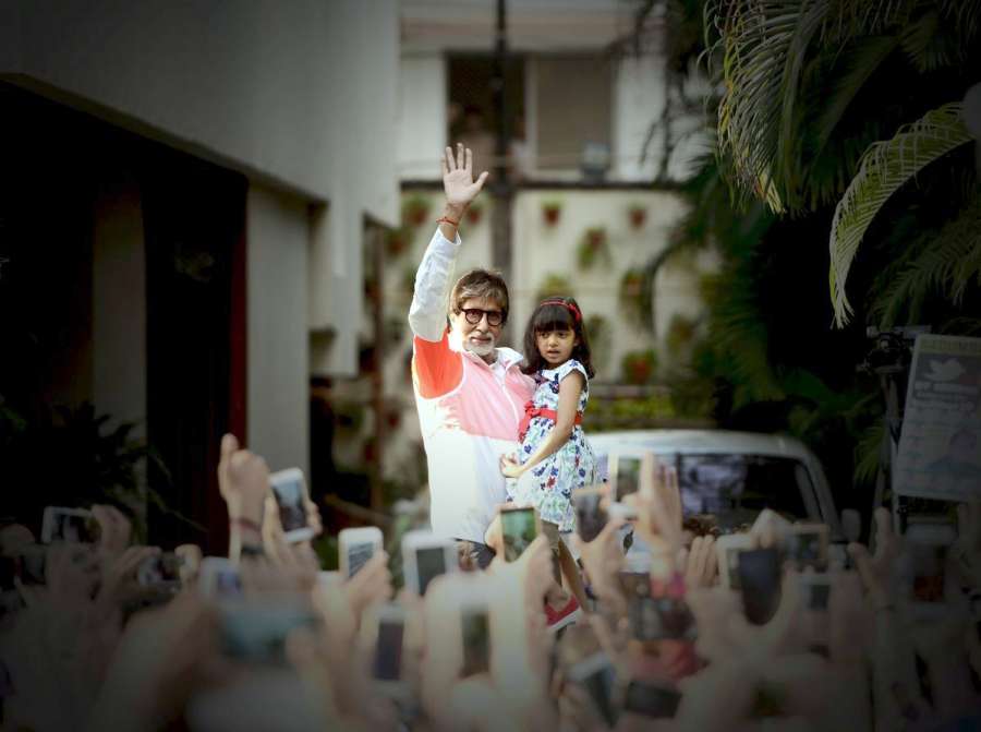 Mumbai: A picture shared by actor Amitabh Bachchan on twitter where he is seen waving at his fans along with his grand daughter Aaradhya Bachchan, in Mumbai on May 28, 2017. by .