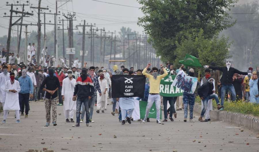 Srinagar: Clashes between security forces and protesters broke out on the occasion of Eid-ul-Fitr in Srinagar on June 26, 2017. (Photo: IANS) by . 