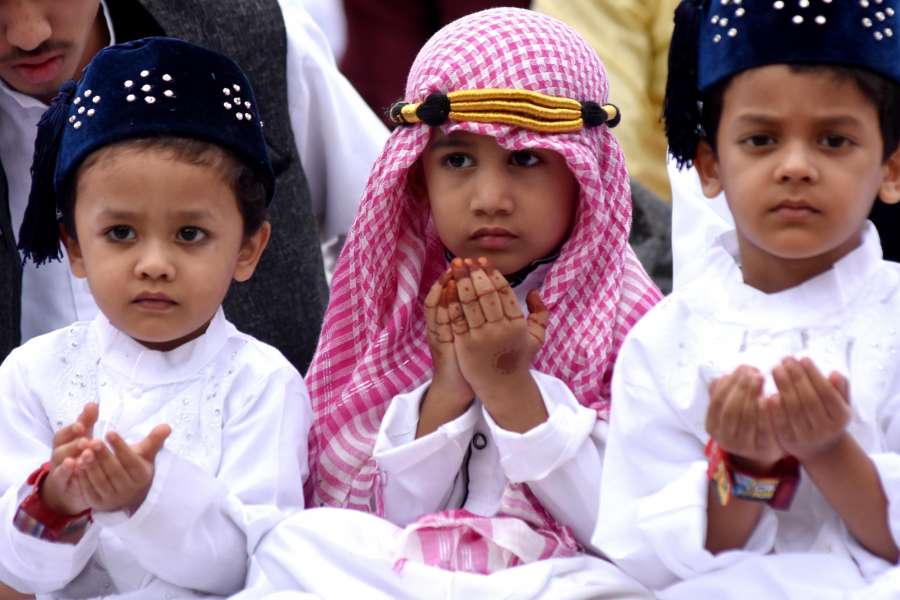 Bengaluru: Children offer prayers on the occasion of Eid-ul-Fitr at Idga Maidan in Bengaluru on June 26, 2017. (Photo: IANS) by . 