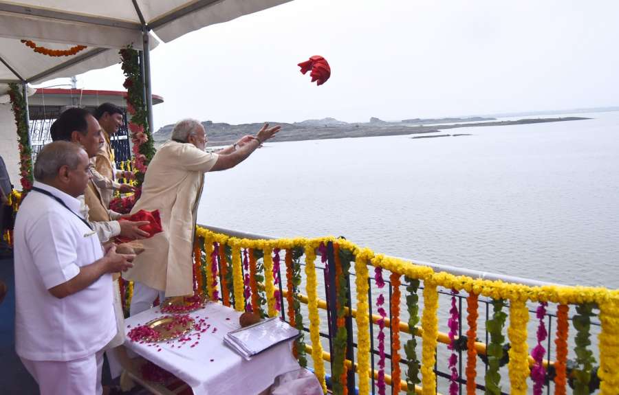 Rajkot: Prime Minister Narendra Modi performs rituals on the inauguration of Aji-3 Dam under Phase-I of Saurashtra Narmada Avtaran Irrigation (SAUNI) Yojana in Rajkot on June 29, 2017. (Photo: IANS/PIB) by . 