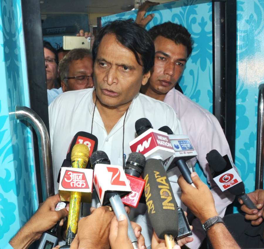 New Delhi: Union Minister for Railways Suresh Prabhu interacts with the media after inspecting the rake of Humsafar Train with added features at Safdarjung Railway Station in New Delhi on June 14, 2017. (Photo: IANS/PIB) by . 