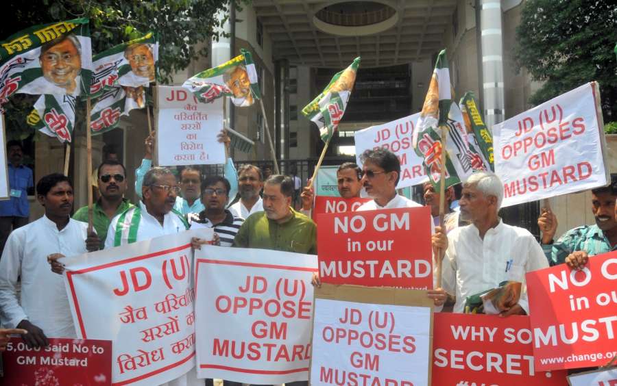 New Delhi: JD(U) workers stage a demonstration against genetically-modified (GM) mustard in New Delhi, on Sept 6, 2016. An Environment Ministry sub-committee report declared the GM mustard technology safe for consumption and environment, saying that it does not raise any public health concerns for human beings and animals, but environmentalists are not satisfied and have been demanding that the ministry should make all the documents on the study available.The environment ministry has asked for comments from the public, before Genetic Engineering Appraisal Committee (GEAC) takes the final decision on GM mustard. Comments can be submitted till October 5. (Photo: IANS) by . 