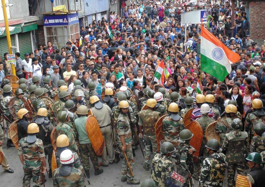 Darjeeling: Gorkha Janmukti Morcha (GJM) supporters clashed with police during a Gorkha Janamukti Morcha (GJM) indefinite shutdown in the northern Bengal hills; in Darjeeling on June 17, 2017. (Photo: IANS) by . 