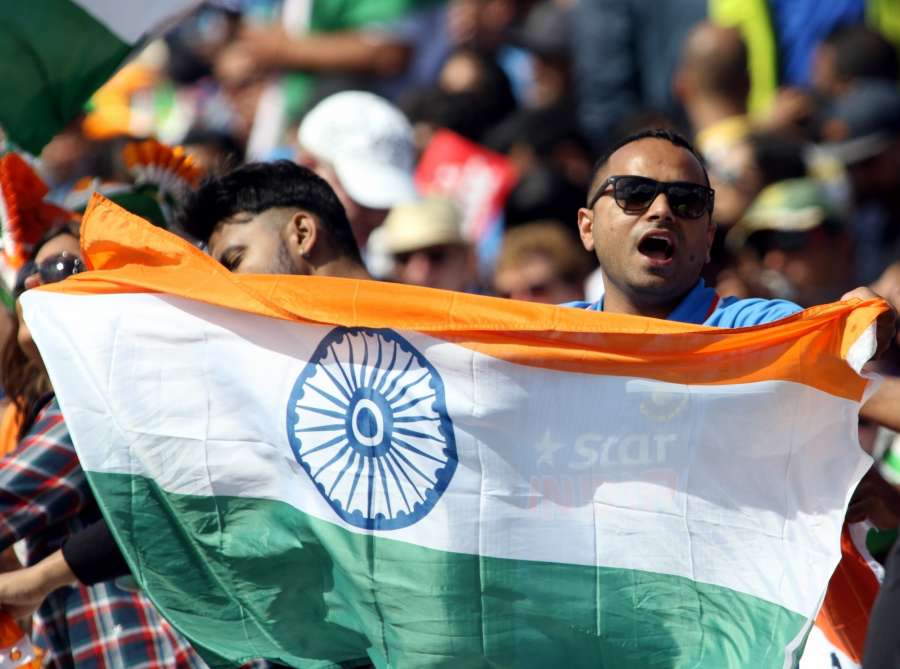 London: Indian fans cheer during an ICC Champions Trophy match between India and South Africa at Kennington Oval in London on June 11, 2017. (Photo: IANS)â by . 