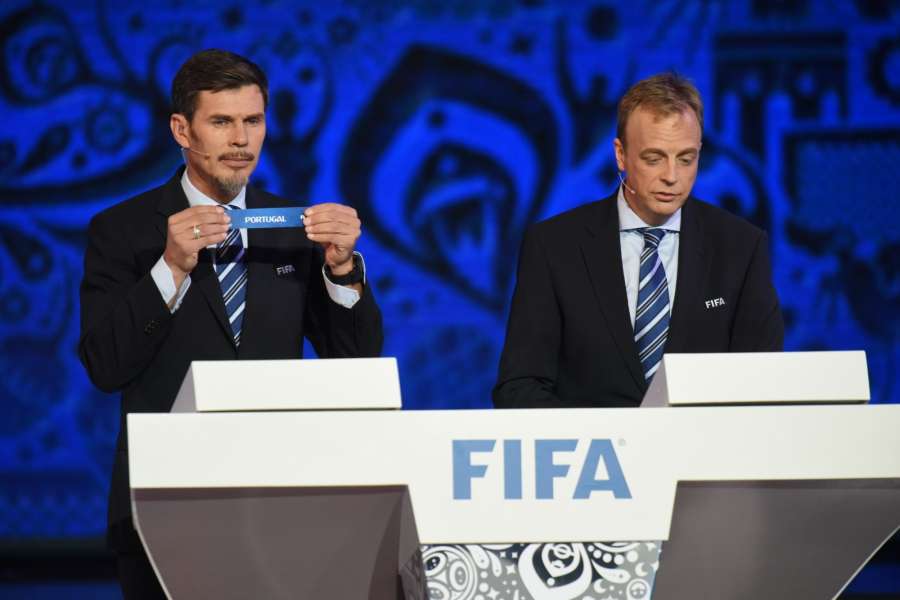 KAZAN, Nov. 27, 2016 (Xinhua) -- Special adviser on the football matters Zvonimir Boban (L) and director of competitions of FIFA Colin Smith show Portugal during the official draw ceremony for Confederations Cup 2017 in Kazan, Russia, Nov. 26, 2016. (Xinhua/Evgeny Sinitsyn/IANS) by .