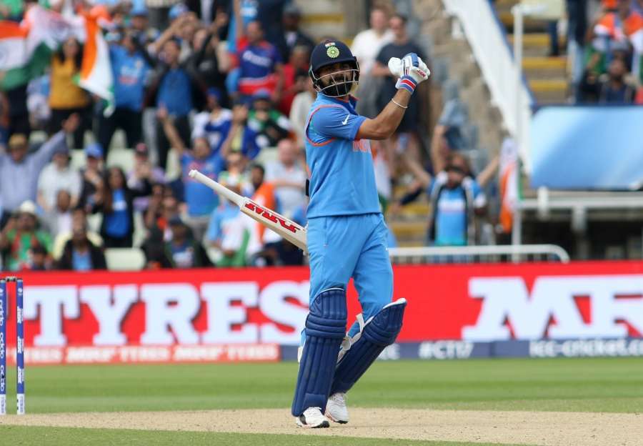Indian captain Virat Kohli celebrates after winning the second semi-final match of ICC Champions Trophy between India and Bangladesh at Edgbaston in Birmingham, Britain on June 15, 2017. (Photo: Surjeet Yadav/IANS) by . 