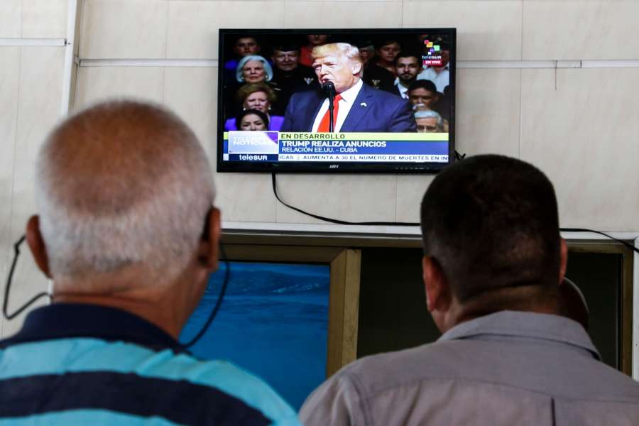 HAVANA, June 17, 2017 (Xinhua) -- People watch a TV screen broadcasting news about the speech of U.S. President Donald Trump at a restaurant in the neighborhood of El Vedado in Havana, Cuba, on June 16, 2017. Cuba's government rejected on Friday the newly announced U.S. policy towards Cuba, but said it is open to continue dialogue with Washington on issues of mutual interest. U.S. President Donald Trump earlier in the day announced he was "canceling" the rapprochement with Cuba spearheaded by his predecessor Barack Obama. (Xinhua/Str/IANS) by . 