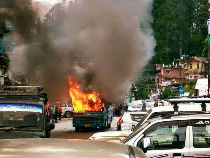 Darjeeling: A bus that was torched by Gorkha Janmukti Morcha (GJM) activists during a demonstration in Darjeeling on June 8, 2017. (Photo: IANS) by . 