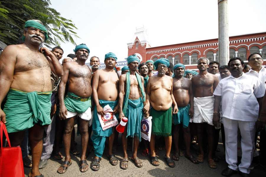 Chennai: Tamil Nadu farmers who staged a demonstration for over 40 days at Delhi's Jantar Mantar to demands loan waivers, drought relief packages and formation of a Cauvery management board to resolve their irrigation issues return back to Chennai on April 25, 2017. (Photo: IANS) by .