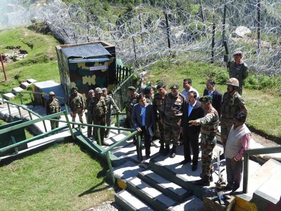 Kashmir: Union MoS Defence Dr. Subhash Bhamre during his visit to forward areas along the Line of Control in Jammu and Kashmir on June 9, 2017. (Photo: IANS) by . 