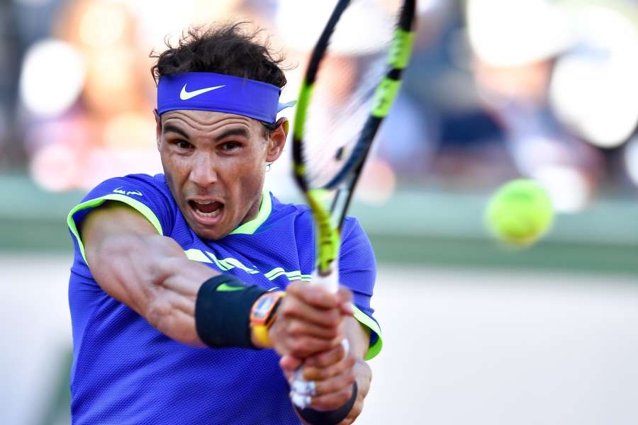 PARIS, June 10, 2017 (Xinhua) -- Rafael Nadal of Spain returns the ball during the men's singles semifinal against Dominic Thiem of Austria at the French Open Tennis Tournament 2017 in Paris, France on June 9, 2017. Rafael Nadal won 3-0. (Xinhua/Chen Yichen/IANS) by . 