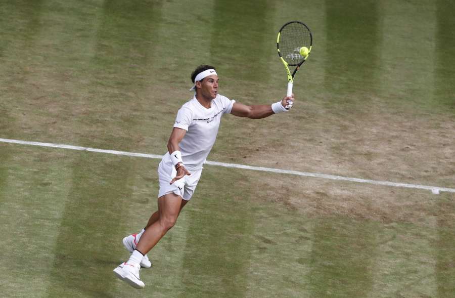 LONDON, July 8, 2017 (Xinhua) -- Rafael Nadal of Spain hits a return during the men's singles third round match against Karen Khachanov of Russia at the Championship Wimbledon 2017 in London, Britain, on July 7, 2017. Nadal won 3-0. (Xinhua/Han Yan/IANS) by . 