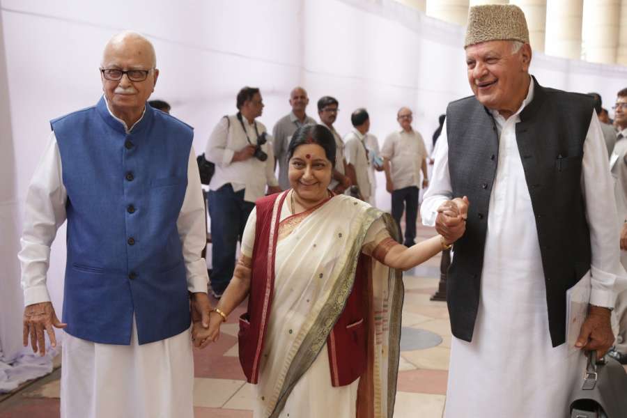 New Delhi: External Affairs Minister Sushma Swaraj, BJP veteran L.K. Advani and National Conference (NC) president Farooq Abdullah arrive at Parliament to cast their votes during presidential polls in New Delhi, on July 17, 2017. (Photo: Amlan Paliwal/IANS) by .