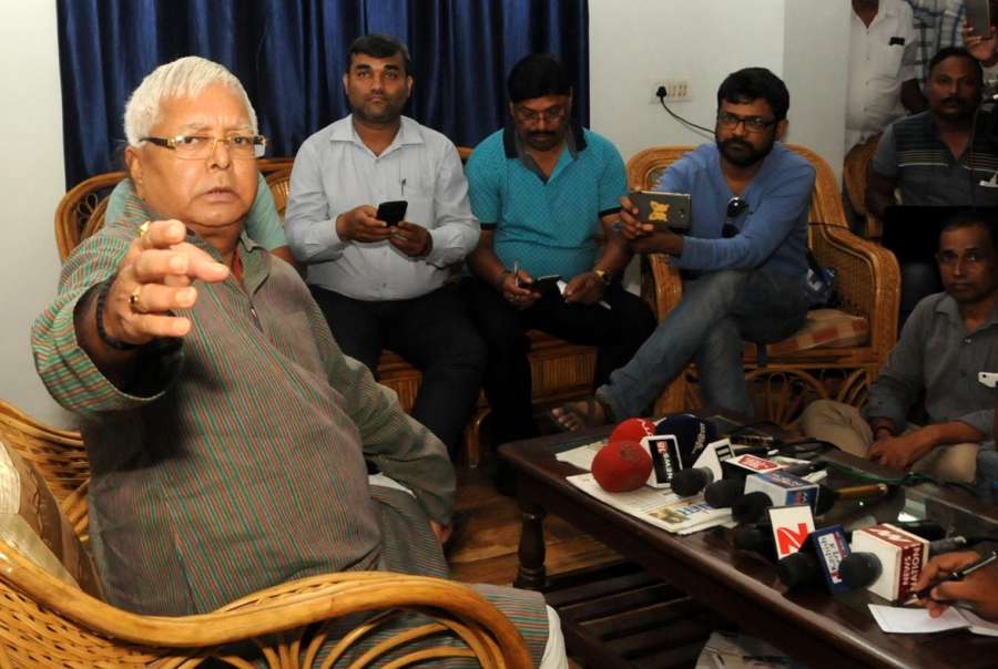 Ranchi: Rashtriya Janata Dal (RJD) Supremo Lalu Prasad Yadav addresses a press conference after the Central Bureau of Investigation carried out raids at 12 places in Patna, Delhi, Ranchi, Puri and Gurugram in connection with a fresh case of alleged irregularities in awarding tender for the maintenance of hotels; in Ranchi on July 7, 2017. (Photo: IANS) by . 