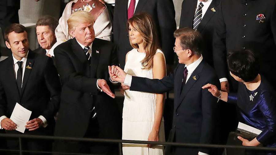 Hamburg: South Korean President Moon Jae-in shakes hands with his U.S. counterpart Donald Trump after a cultural performance in Hamburg on July 7, 2017, in this photo released by Moon's office two days later. (Yonhap/IANS) by . 