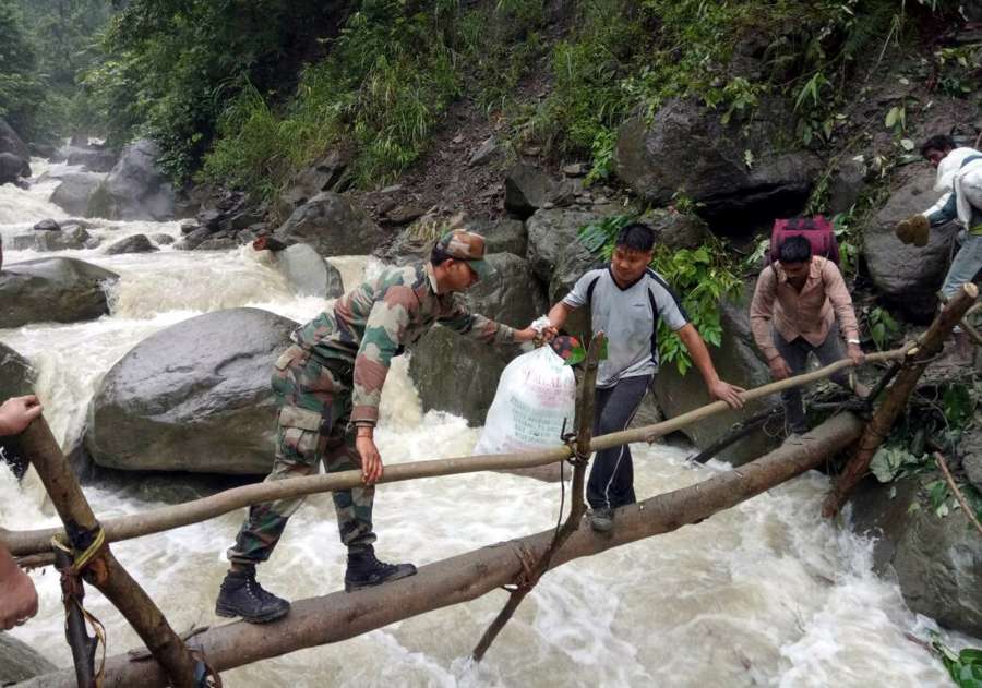 Bhalukpong: Army personnel rescue people from a landslide site in Bhalukpong of Arunachal Pradesh on June 21, 2017. (Photo: IANS) by . 