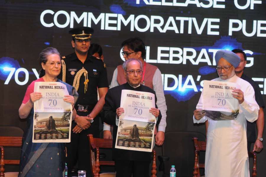 New Delhi: President Pranab Mukherjee, Congress President Sonia Gandhi and former Prime Minister Manmohan Singh during the re-launch of National Herald news paper in New Delhi on July 1, 2017. (Photo: IANS) by .