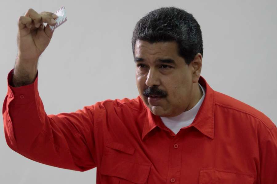 CARACAS, July 30, 2017 (Xinhua) -- Venezuelan President Nicolas Maduro casts his vote during the election for the National Constituent Assembly (ANC), in Caracas, Venezuela, on July 30, 2017. All the polling stations for electing members to the National Constituent Assembly in Venezuela opened at 6:00 a.m. local time (1030 GMT) on Sunday, despite opposition-led protests against the move. (Xinhua/Presidency of Venezuela/IANS) by .
