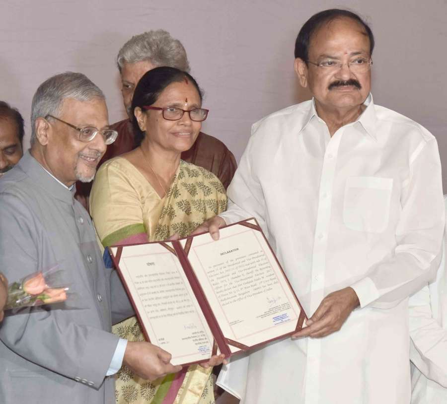 New Delhi: Returning Officer of the Vice-Presidential Election-2017 and Secretary-General of Rajya Sabha Shumsher K. Sheriff presents the declaration of result for the election for the Vice President of India to the Vice President-elect M Venkaiah Naidu, in New Delhi on Aug 5, 2017. (Photo: IANS/PIB) by .