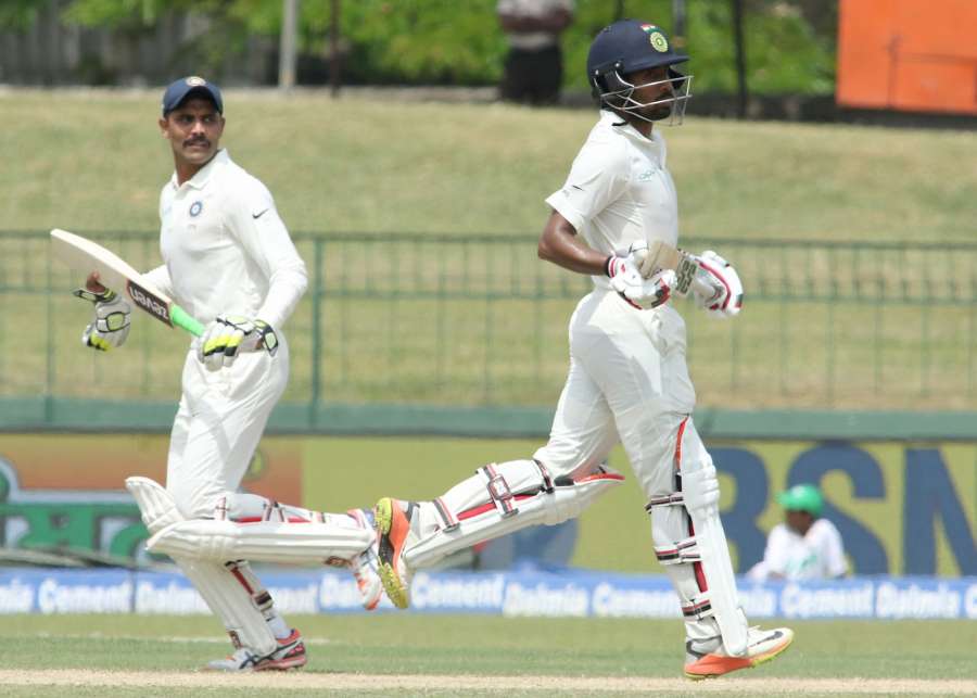 Colombo: India's Wriddhiman Saha and Ravindra Jadeja on Day 2 of the second test match between India and Sri Lanka at Sinhalese Sports Club Ground in Colombo, Sri Lanka on Aug 4, 2017. (Photo: Surjeet Yadav/IANS)​ by .