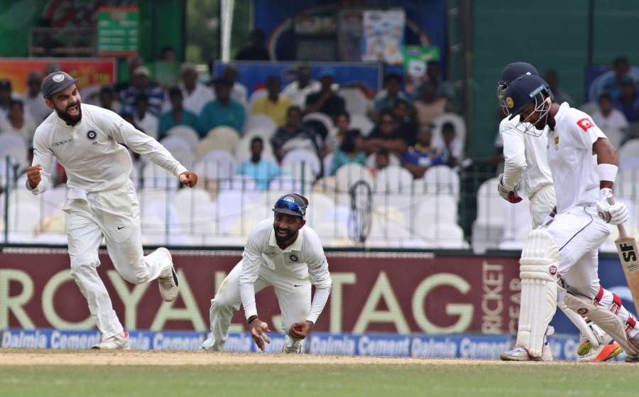 Colombo: Virat Kohli of celebrates fall of a wicket on Day 4 of the second test match between India and Sri Lanka at Sinhalese Sports Club Ground in Colombo, Sri Lanka on Aug 6, 2017. (Photo: Surjeet Yadav/IANS) by .