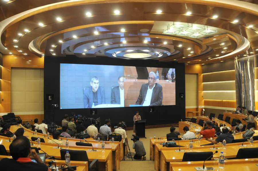 Bengaluru: Infosys executive Vice-chairman Vishal Sikka, Infosys chairman R Seshasayee and Infosys co-chairman Ravi Venkatesan during Infosys' press conference in Bengaluru on Aug 18, 2017. (Photo: IANS) by .