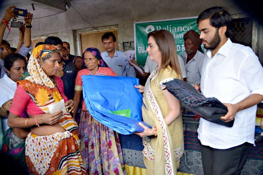 Banaskantha: Reliance Foundation (RF) Chairperson Nita Ambani meets flood victims of Banaskantha district of Gujarat on Aug 9, 2017. (Photo: IANS) by .