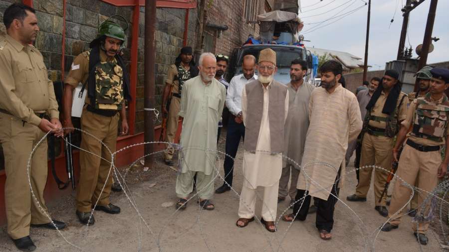 Srinagar: Hardline Hurriyat Conference chairman Syed Ali Shah Geelani being taken away by police after he tried to proceed towards martyrs' graveyard in Khawaja Bazar area of Srinagar, on July 13, 2017. (Photo: IANS) by . 