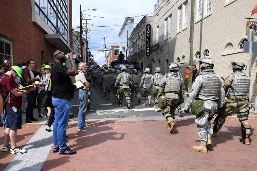CHARLOTTESVILLE (U.S.), Aug. 12, 2017 (Xinhua) -- Police patrol near the rally site in Charlottesville, Virginia, the United States, Aug. 12, 2017. At least one person was killed in a multiple car crash following a violent white nationalist rally on Saturday in Charlottesville in Virginia, Charlottesville Mayor Michael Signer said. (Xinhua/Yin Bogu/IANS) by .