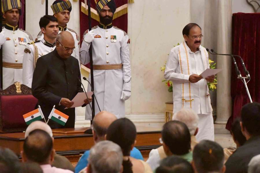 New Delhi: President Ram Nath Kovind administering the oath of office to Venkaiah Naidu as Vice-President during the swearing-in-ceremony at Rashtrapati Bhavan on Aug. 11, 2017. (Photo: IANS/RB) by .