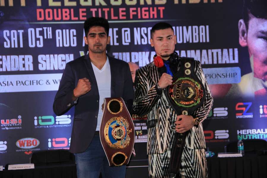 Mumbai: WBO Asia Pacific Super Middleweight champion Vijender Singh and WBO Oriental Super Middleweight champion Zulpikar Maimaitiali during a press conference regarding 'Battleground Asia' in Mumbai, on June 27, 2017. (Photo: IANS) by .