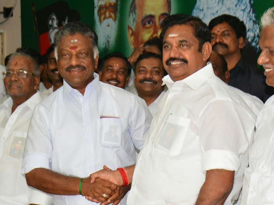 Chennai: Tamil Nadu Chief Minister Edappadi K. Palaniswami along with the state's former chief minister O. Paneerselvam during the merger of the two factions of AIADMK at the party's headquarters in Chennai on Aug 21, 2017. (Photo: IANS) by . 