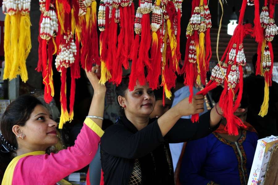 Amritsar: Women busy with Rakhi shopping ahead of Raksha Bandhan in Amritsar on Aug 5, 2017. (Photo: IANS) by .