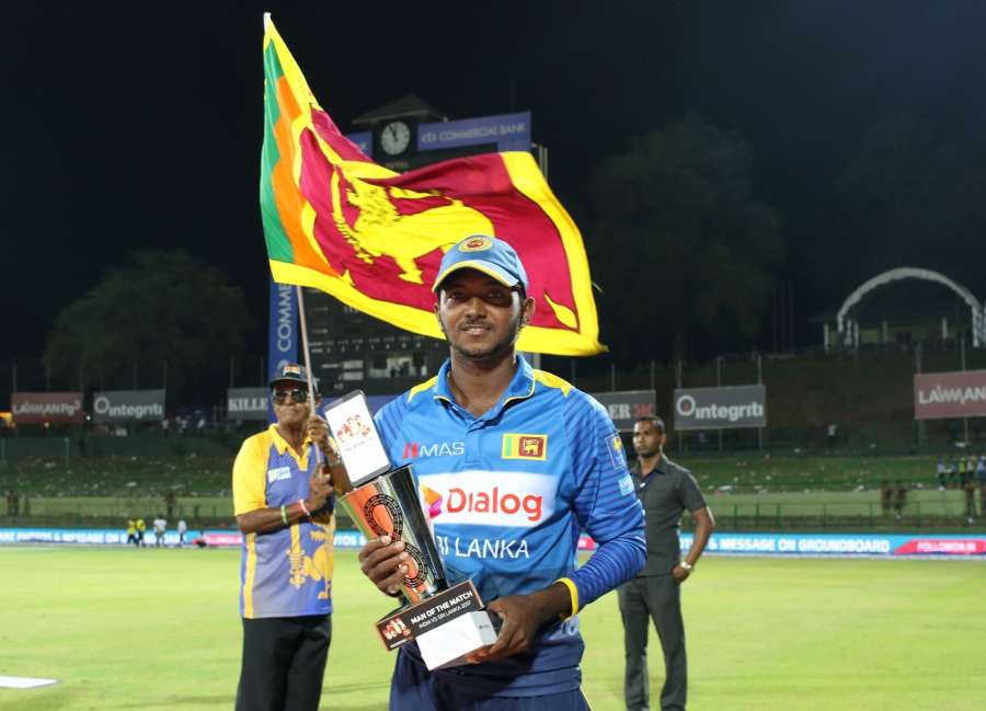 Pallekele: Sri Lanka's Akila Dananjaya with the Man of the Match trophy during the second one-day international cricket match between India and Sri Lanka in Pallekele, Sri Lanka on Aug. 24, 2017. (Photo: Surjeet Yadav/IANS) by .