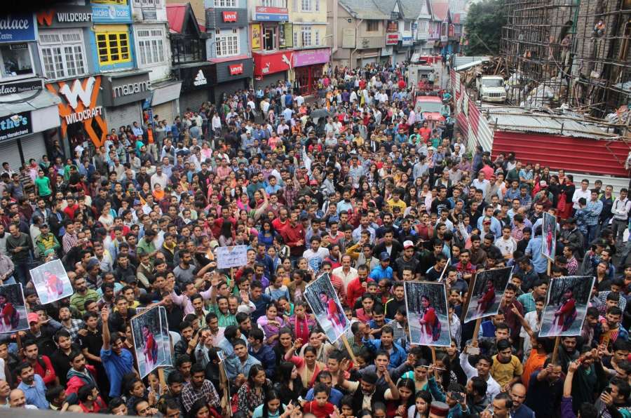 Shimla: People in large numbers stage a demonstration to demand justice for the 16-year-old gang-rape victim, whose body was found in the forests in Kotkhai town in Shimla district on 6th July; in Shimla on July 20, 2017. (Photo: IANS) by .