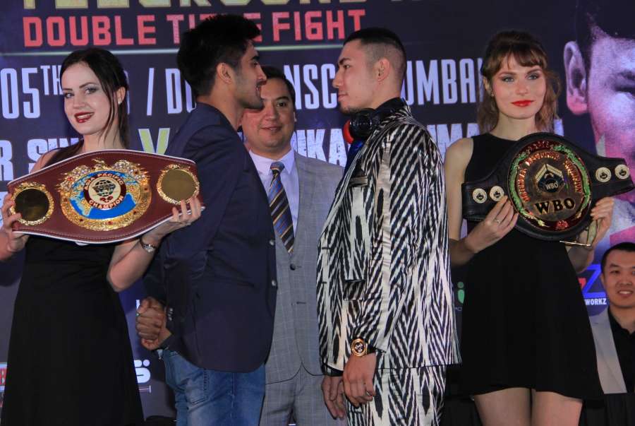Mumbai: WBO Asia Pacific Super Middleweight champion Vijender Singh and WBO Oriental Super Middleweight champion Zulpikar Maimaitiali during a press conference regarding 'Battleground Asia' in Mumbai, on June 27, 2017. (Photo: IANS) by .