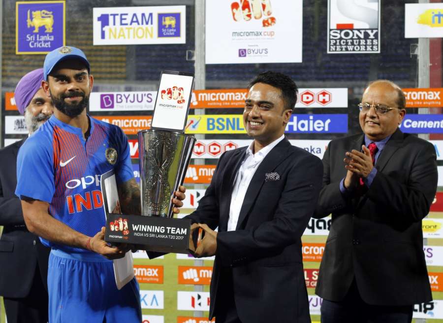 Colombo: Indian skipper Virat Kohli with the winner's trophy after winning the T20I match against Sri Lanka at R.Premadasa Stadium in Colombo, Sri Lanka on Sept 6, 2017. (Photo: Surjeet Yadav/IANS) by .