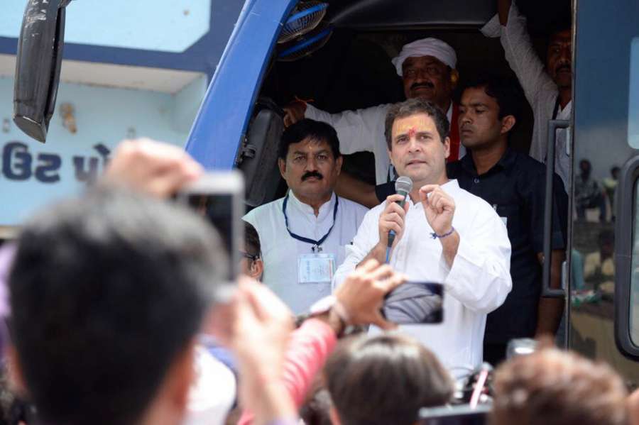 Hanjadapar: Congress Vice President Rahul Gandhi addresses during a road show at Hanjadapar village in Dwarka district of Gujarat on Sept 25, 2017. (Photo: IANS) by .