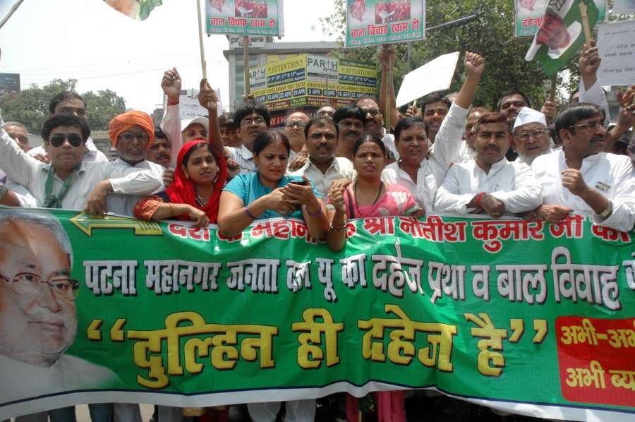 Patna: JD(U) workers stage a demonstration against dowry and child marriage in Patna on May 7, 2017. (Photo: IANS) by .