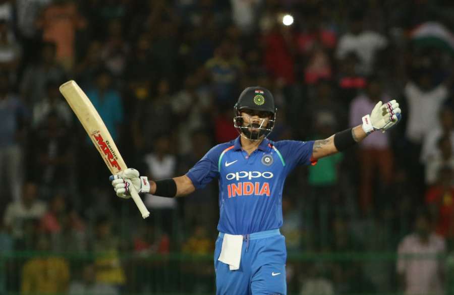 Indian skipper Virat Kohli celebrates his century during the fifth ODI match between India and Sri Lanka at R.Premadasa Stadium in Colombo, Sri Lanka on Sept 3, 2017. (Photo: Surjeet Yadav/IANS) by .