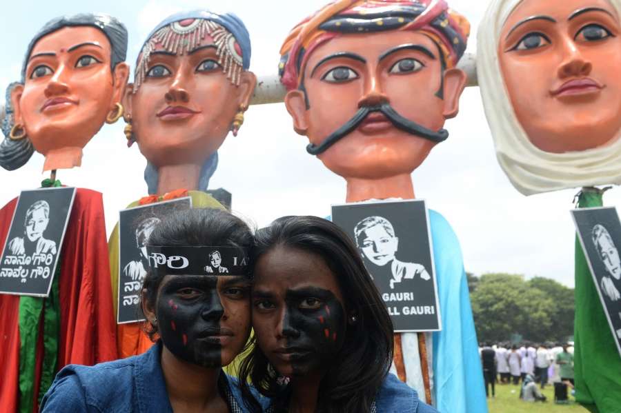 Bengaluru: Volunteers during a protest rally against the killing of journalist turned activist Gauri Lankesh at Central College Ground in Bengaluru on Sept 12, 2017. (Photo: IANS) by .