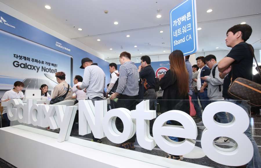 Seoul: Customers who have preordered the Galaxy Note 8, the newest smartphone from Samsung Electronics, wait in line to open a subscription service at a mobile carrier store in Seoul on Sept. 15, 2017. The official launch of the smartphone is Sept. 21, but people who placed advance orders were able to get it from the day. (Yonhap/IANS) by .