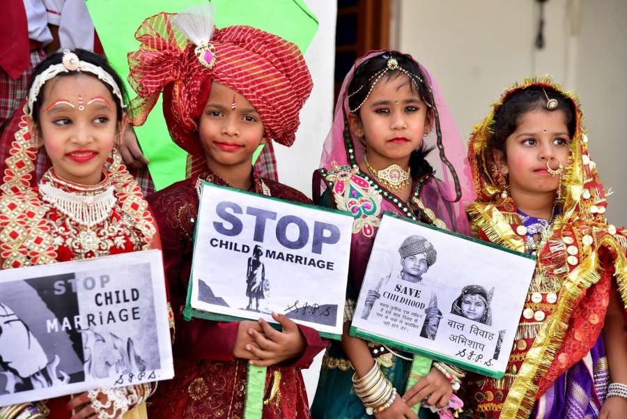 Bikaner: School children participate in an awareness campaign organised to stop child marriage on 'Akshaya Tritiya' in Bikaner of Rajasthan on April 27, 2017. (Photo: IANS) by . 