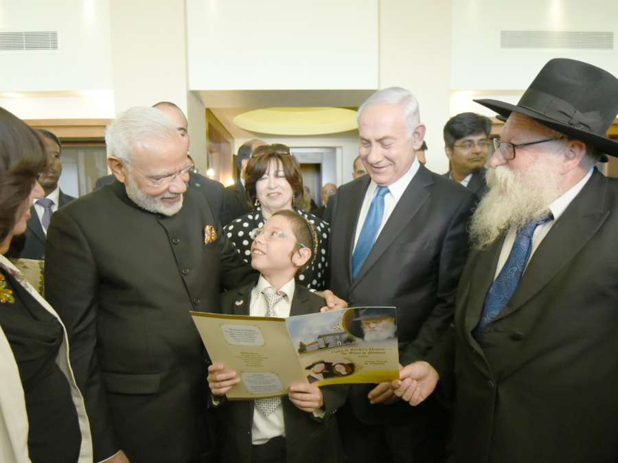 Jerusalem: Prime Minister Narendra Modi meets Moshe Holtzberg, the little boy who was orphaned in the 26/11 terror attack on the Chabad House, in Jerusalem, Israel on July 5, 2017. (Photo: IANS/PIB) by .