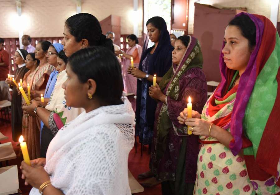 Kochi: People offer thanks giving prayers after Kerala Catholic priest Tom Uzhunnallil, abducted by terrorists in Aden in March last year, has been rescued from captivity from an undisclosed location in Yemen, at Kerala Catholic Bishops' Council (KCBC) headquarters in Kochi, Kerela on Sept 12, 2017. (Photo: IANS) by .