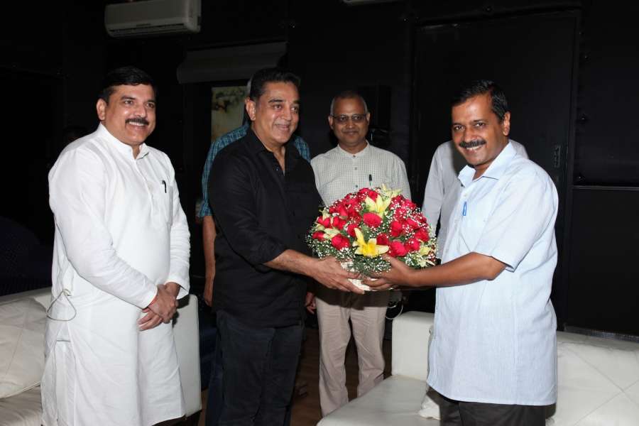 Chennai: Actor Kamal Haasan greets Delhi Chief Minister Arvind Kejriwal at his residence in Chennai on Sept 21, 2017. Also seen AAP leaders Sanjay Singh and Somnath Bharti. (Photo: IANS) by .