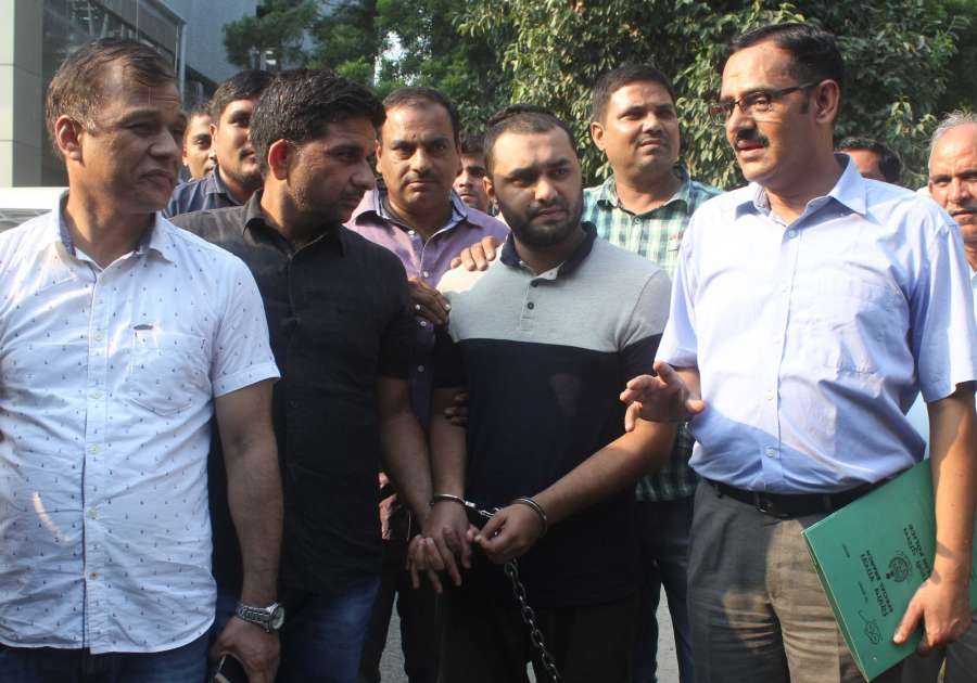 New Delhi: Al Qaeda terrorist Shumon Haq in the custody of Police's Special Cell officers at the Police headquarters in New Delhi on Sept 18, 2017. Haq who came with a mission to set up base Manipur or Mizoram and radicalise Rohingya Muslims to fight the military in Myanmar, was arrested near Shakarpur area of east Delhi on Sept 17, 2017. (Photo: IANS) by .